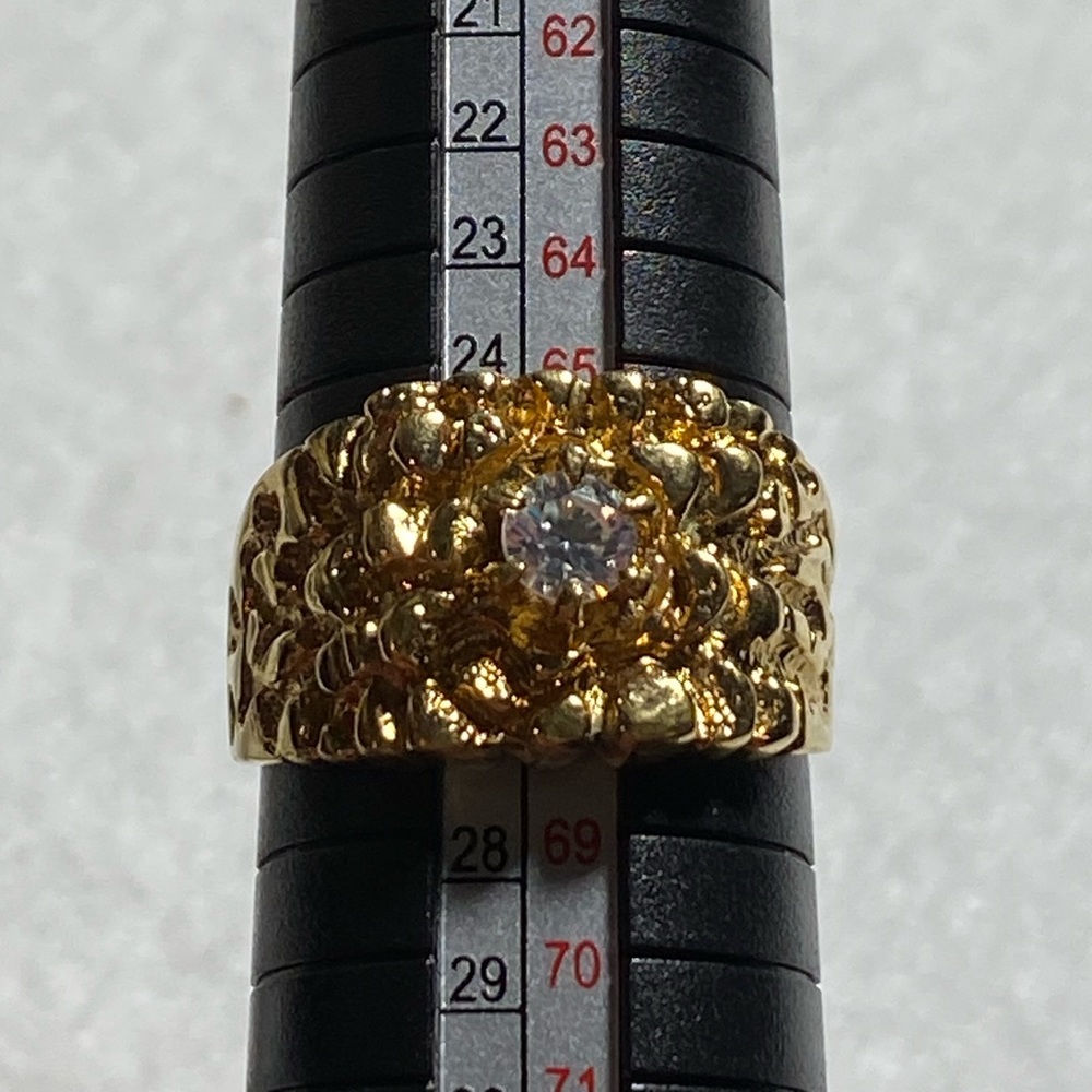 Park Lane gold toned ring with small clear rhinestone.  Size 12